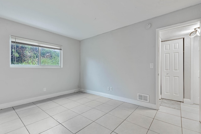 view of tiled spare room