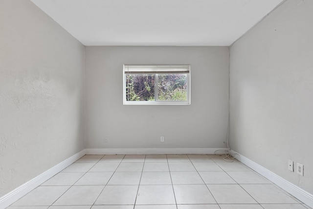 view of tiled spare room