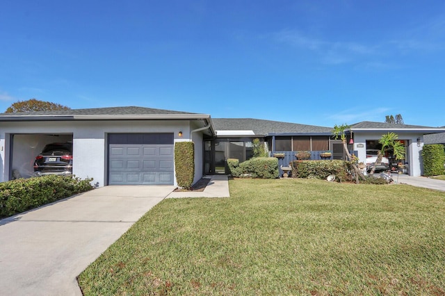 view of front facade featuring a garage and a front yard