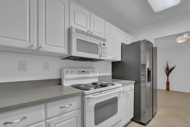 kitchen featuring ceiling fan, white cabinetry, white appliances, and light tile patterned floors