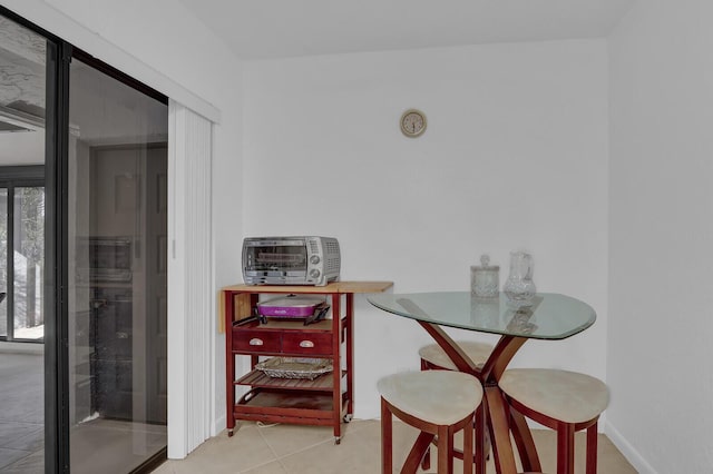 dining room with light tile patterned floors