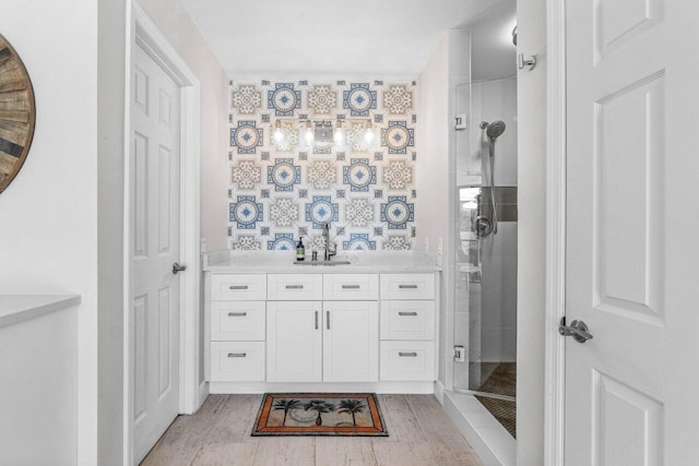 bathroom featuring vanity and walk in shower