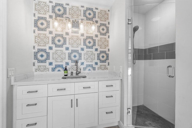 bathroom with vanity and walk in shower