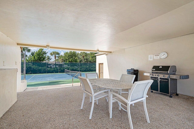 dining area with a textured ceiling