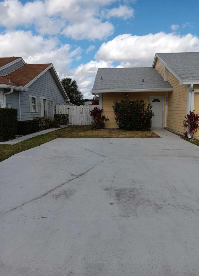 view of side of property with a garage