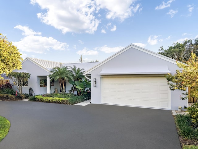 ranch-style house with a garage