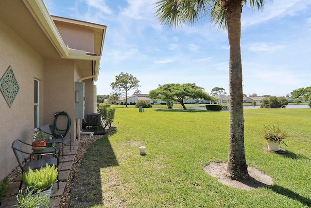 view of yard featuring central AC unit