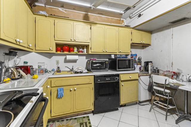 kitchen featuring sink, stainless steel appliances, and light tile patterned flooring