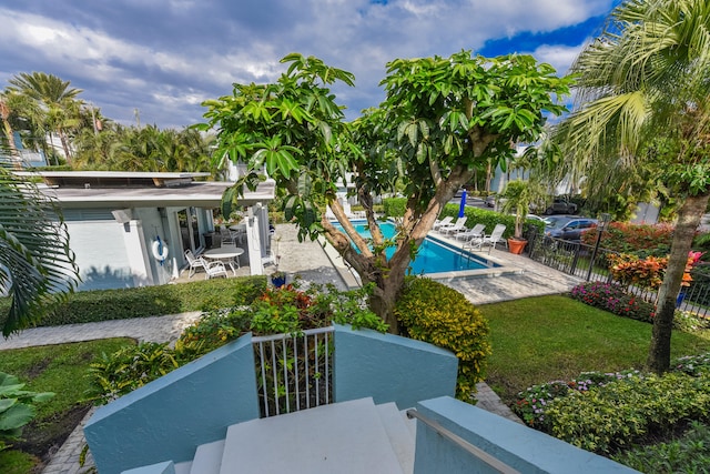 view of swimming pool featuring a patio area