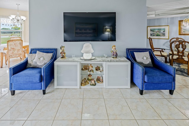 living area featuring an inviting chandelier