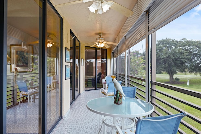 sunroom / solarium with ceiling fan