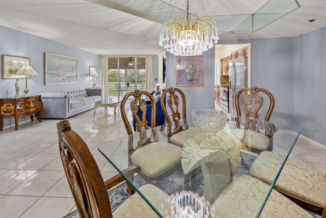 tiled dining space with a textured ceiling and a notable chandelier