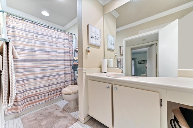 bathroom featuring crown molding, tile patterned flooring, vanity, and toilet