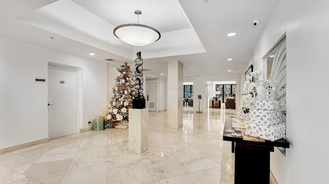 interior space featuring a tray ceiling