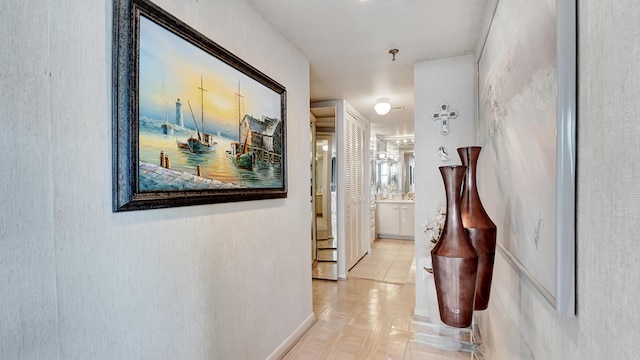 corridor featuring light tile patterned floors