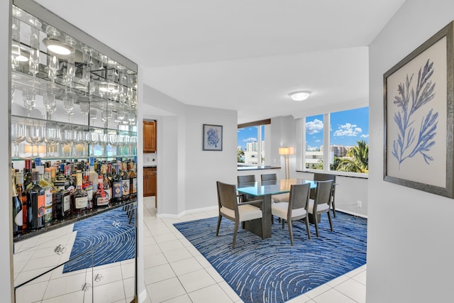 dining room featuring light tile patterned flooring