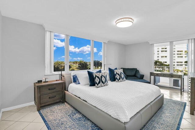 bedroom featuring light tile patterned floors