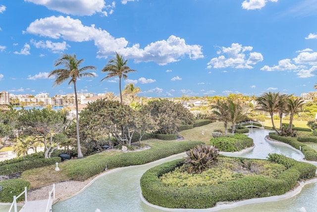 surrounding community featuring a water view