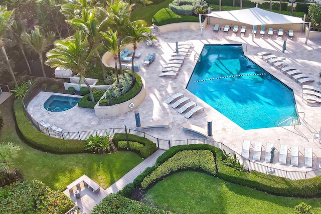 view of pool featuring a hot tub