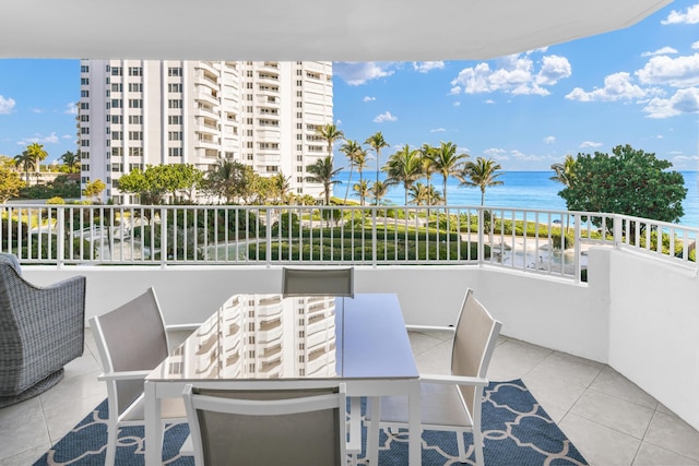 balcony featuring a water view