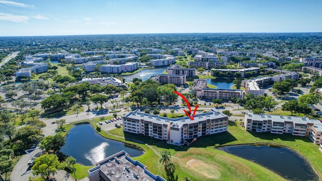 drone / aerial view featuring a water view