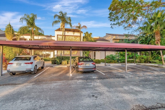 view of vehicle parking featuring a carport