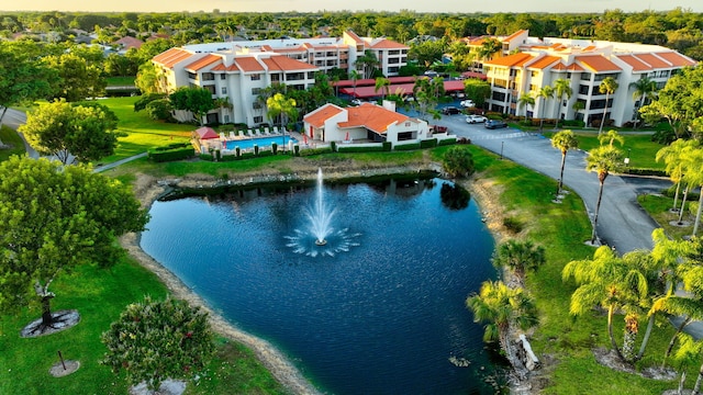 drone / aerial view with a water view