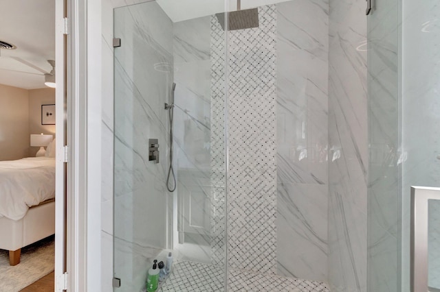 bathroom featuring a tile shower