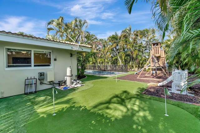 view of yard featuring a fenced in pool