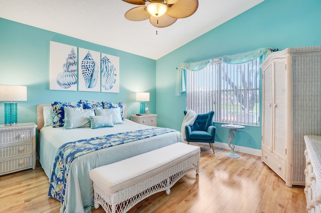 7708 Cherry Blossom Way, Boynton Beach, FL 33437 - bedroom featuring lofted ceiling, wood finished floors, and a ceiling fan