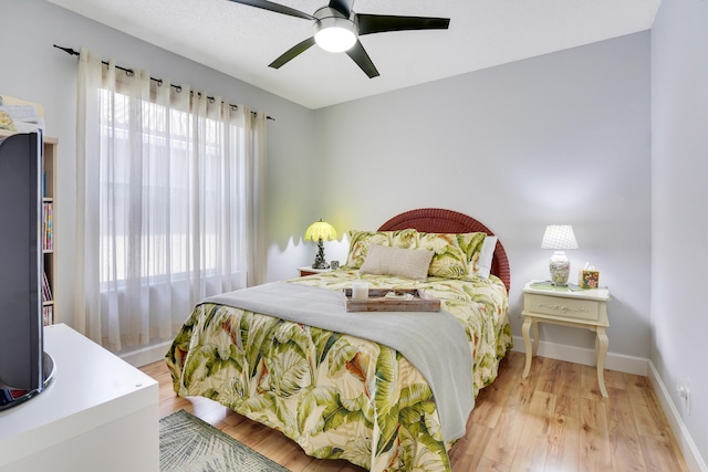 7708 Cherry Blossom Way, Boynton Beach, FL 33437 - bedroom with light wood-type flooring and ceiling fan