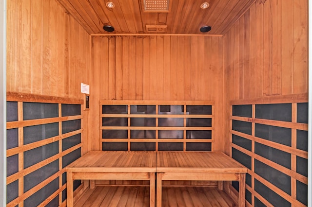 7708 Cherry Blossom Way, Boynton Beach, FL 33437 - relaxing sauna / steam room with wooden ceiling, wood walls, wood finished floors, and recessed lighting