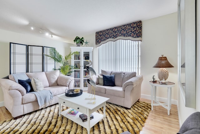 7708 Cherry Blossom Way, Boynton Beach, FL 33437 - living room with wood finished floors and track lighting