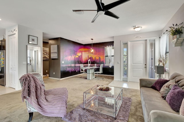 living room featuring ceiling fan and light colored carpet