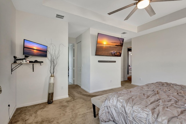 bedroom with light colored carpet and ceiling fan