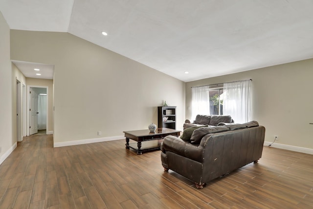 living room with vaulted ceiling