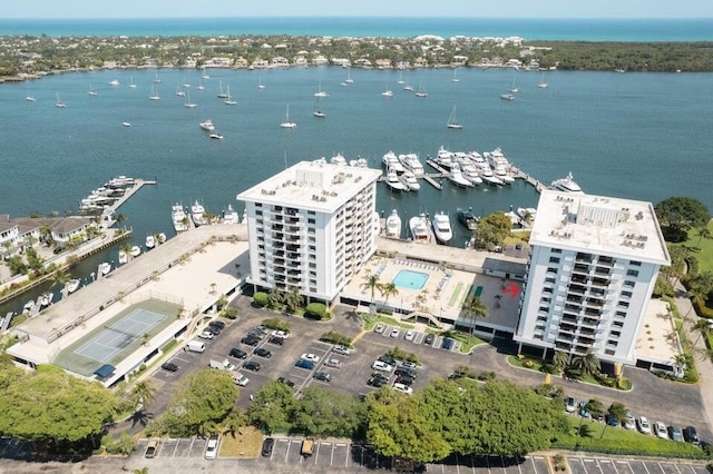 birds eye view of property with a water view