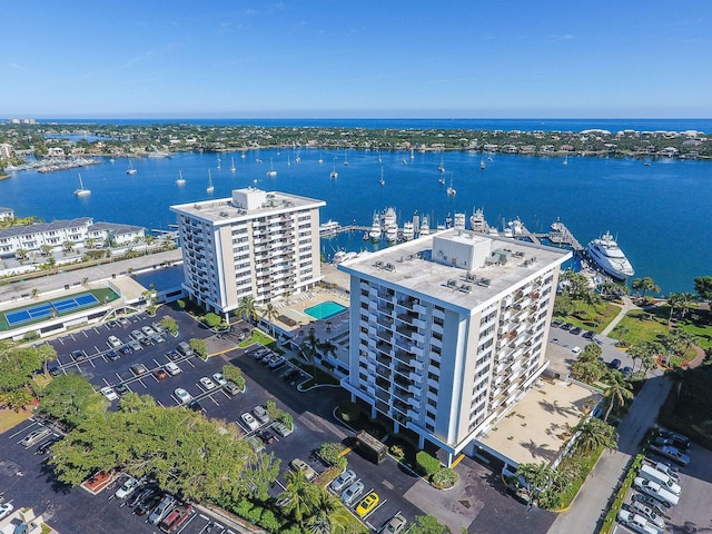 birds eye view of property featuring a water view