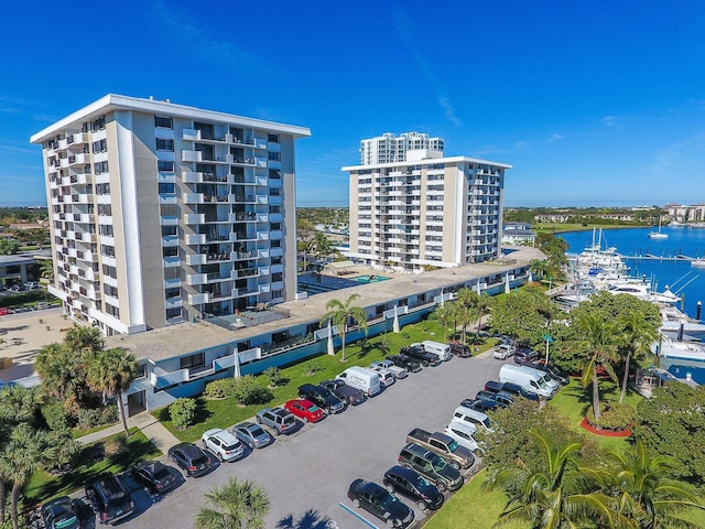 birds eye view of property with a water view