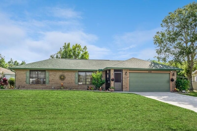 ranch-style house with a garage and a front lawn