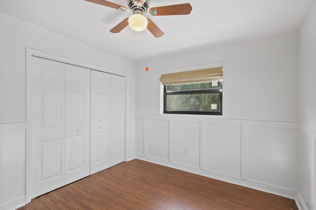 empty room with hardwood / wood-style floors