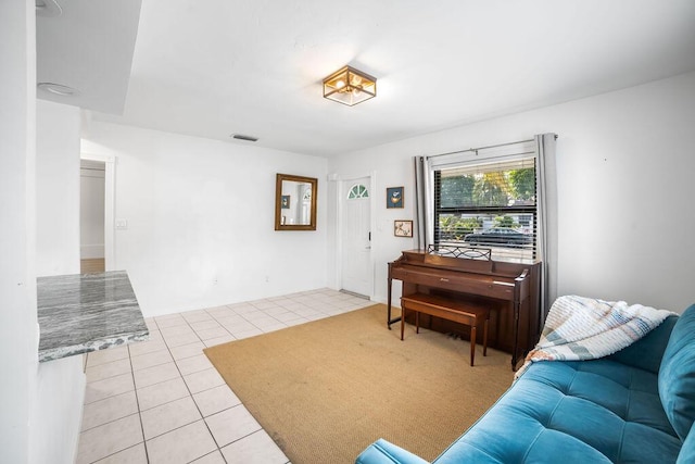611 Monceaux Rd, West Palm Beach, FL 33405 - living area featuring light tile patterned floors