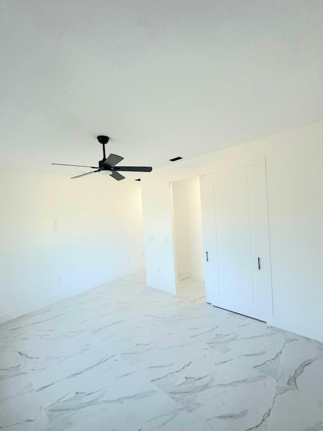 empty room with ceiling fan