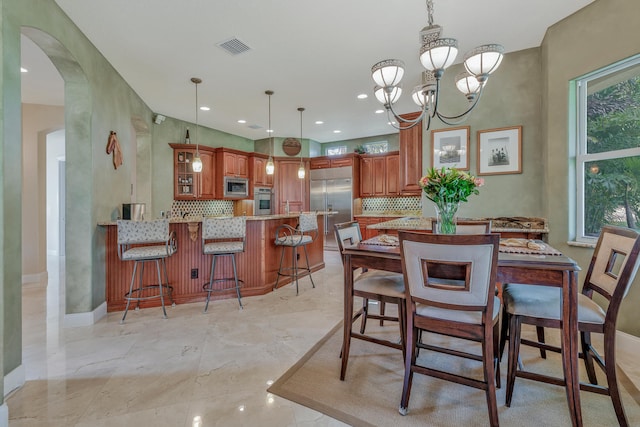 dining room featuring an inviting chandelier