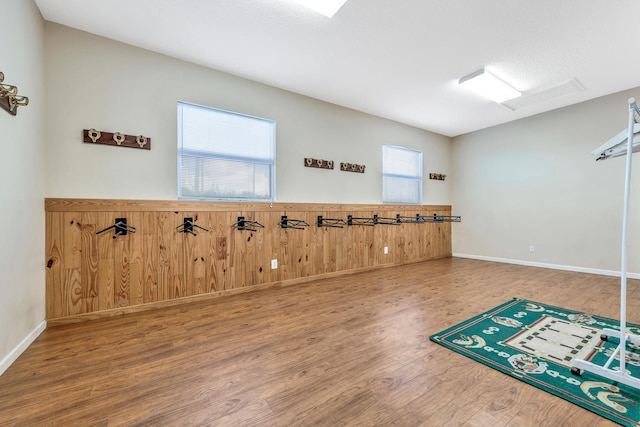 exercise area with hardwood / wood-style flooring