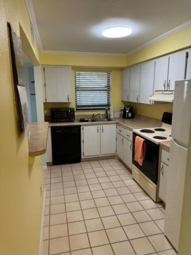 kitchen featuring light tile patterned flooring, sink, ornamental molding, and black appliances