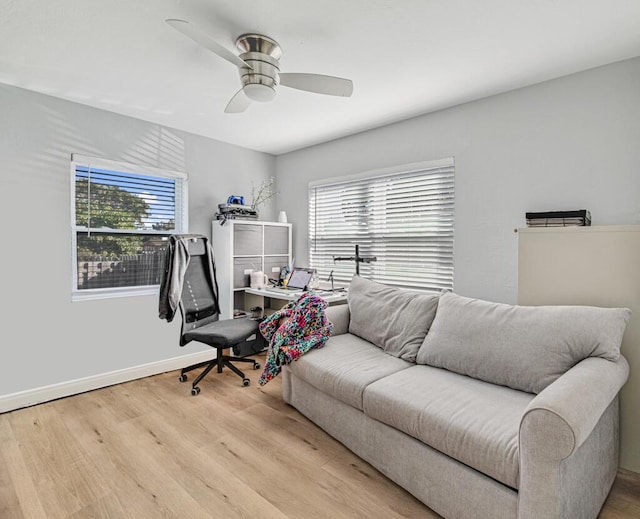 office area featuring ceiling fan and light wood-type flooring