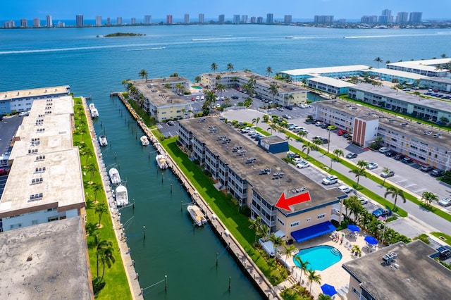 birds eye view of property featuring a water view