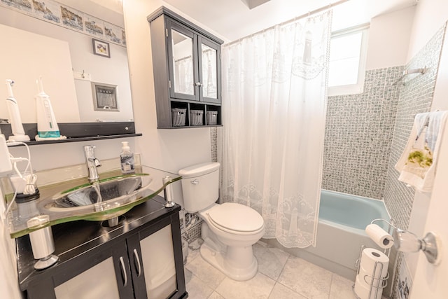 full bathroom featuring tile patterned floors, shower / bath combo, toilet, and vanity