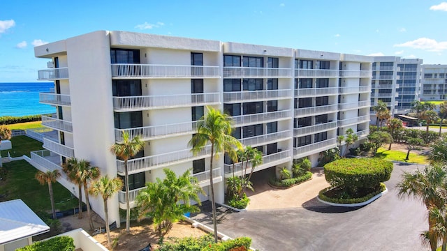 view of building exterior featuring a water view